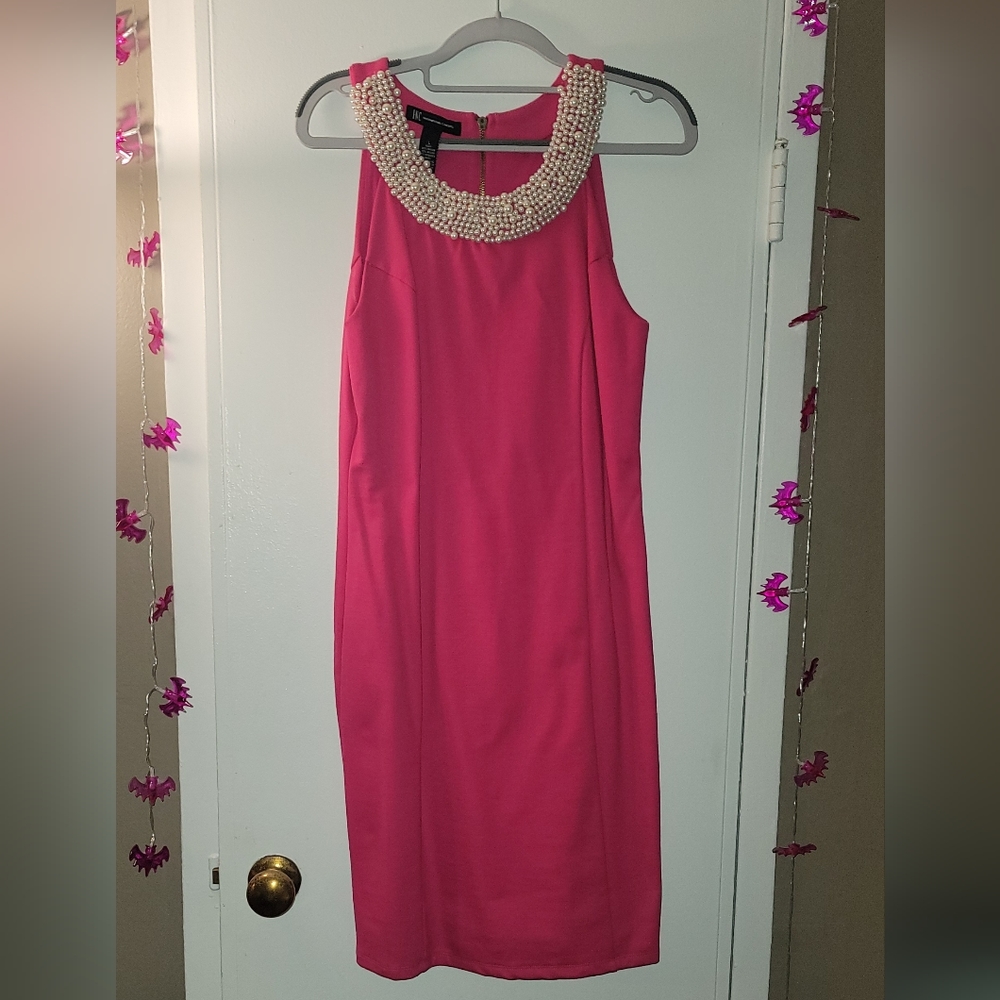 Women's pink cocktail dress purchased from Carson's, never worn.
